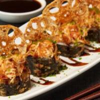 Spicy Lotus Tempura Roll · Krab and cream cheese rolled in rice and seaweed, lightly tempura battered and topped with s...