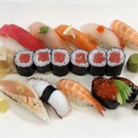 Sushi Combination Deluxe · Tuna Roll served with a piece of tuna, salmon, salmon roe, snapper, eel, yellowtail, shrimp,...
