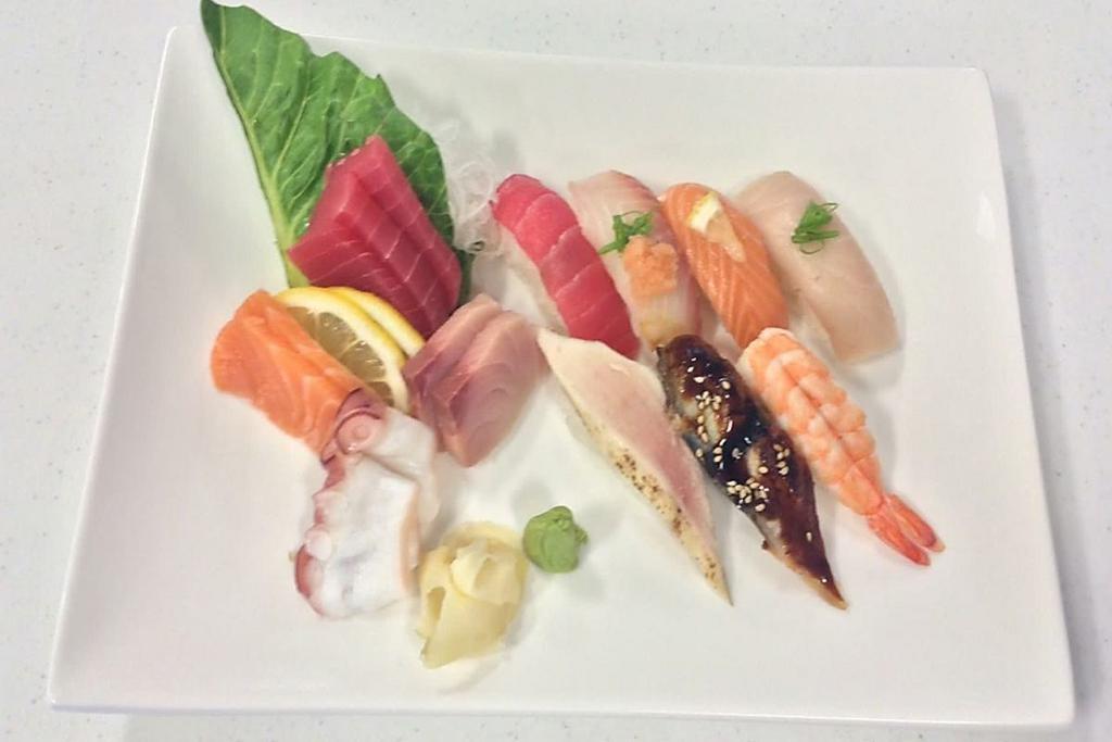 Sushi & Sashimi Combo · Three slices of tuna, two slices of each: salmon, octopus, yellowtail served with a piece of tuna, salmon, snapper, albacore tuna, eel, yellowtail and shrimp nigiri.