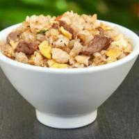 Hibachi Steak Rice · Grilled steak, rice, egg and chopped vegetables.