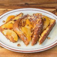 Peach French Toast · 4 slices of sweet thick french toast drizzled  in warm caramelized peaches and sauce. Topped...