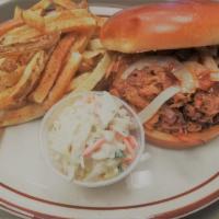 Pulled Pork sandwich · Slow smoked with special dry rub served with roasted onion and red bell pepper or house-made...