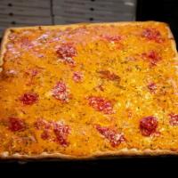 Drunken Grand Ma Square Pie · Thin crust square, with fresh mozzarella cheese, topped with our famous vodka sauce.