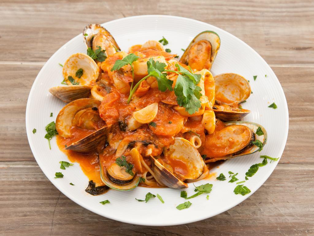 Seafood Marinara · Linguine with fresh mussels, calamari and shrimp.