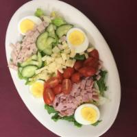 Chef Salad · lettuce, ham, turkey, hard boiled egg, cucumber, tomato, and swiss cheese