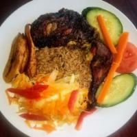 Jerk Chicken Platter · Served with rice and beans. Steamed cabbage and plantain.