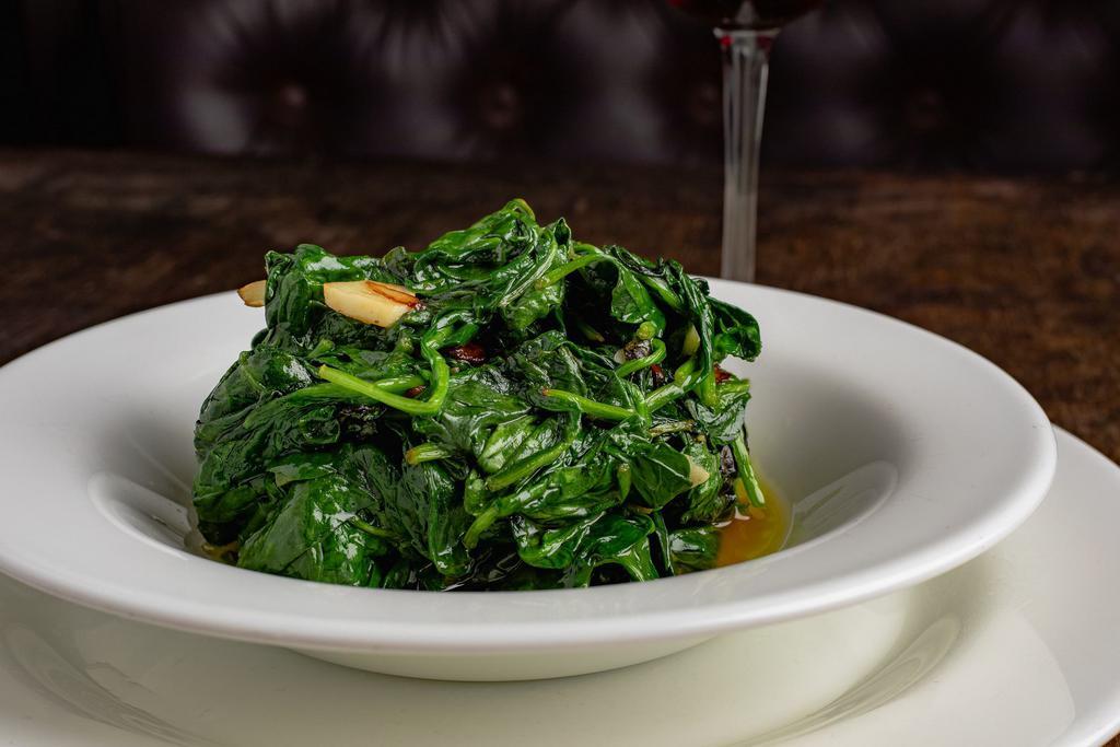 Sauteed Spinach · Spinach sautéed with garlic and extra virgin olive oil.