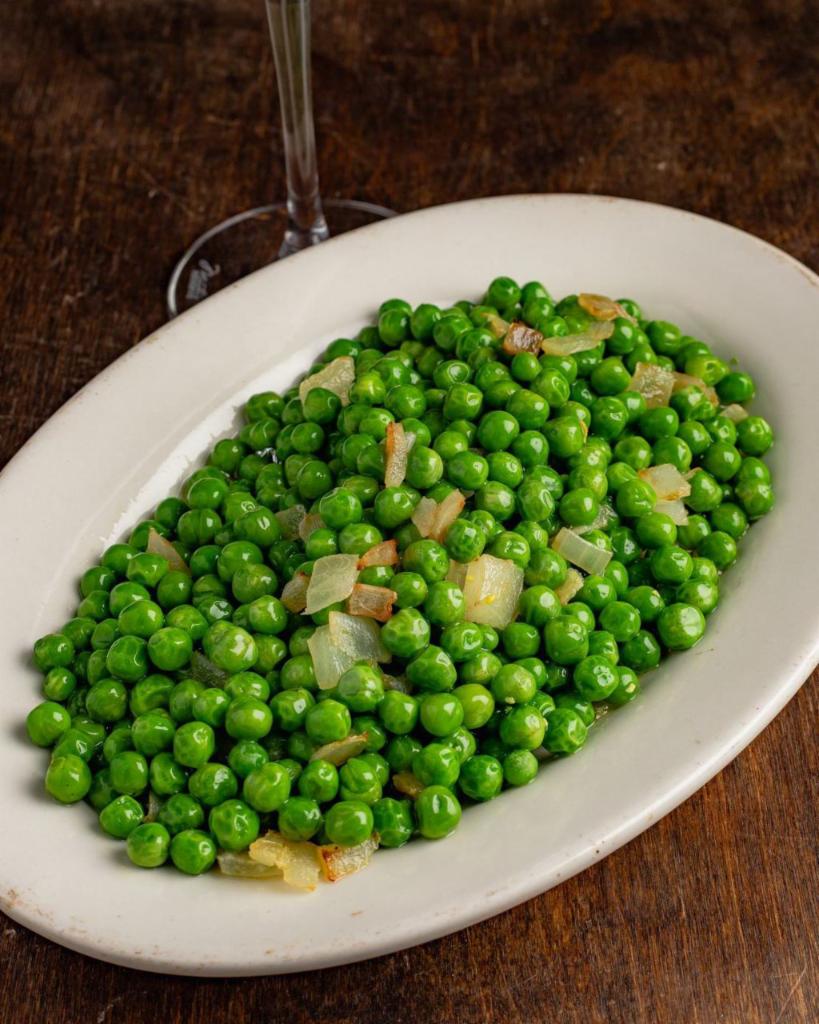 Peas and Onions · Diced onions mixed with green peas and sautéed.
