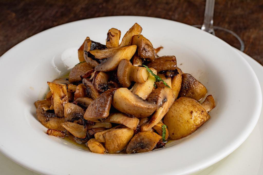 Sauteed Mushrooms · Button Mushrooms mixed with onions sautéed with garlic and extra virgin olive oil.
