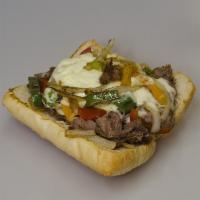 Philly Cheesesteak · Italian beef smothered in nacho cheese with grilled bell peppers and onions on a bun  