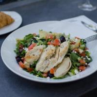 Chicken Mediterranean Salade · Our organic house salad blend tossed with homemade creamy balsamic dressing, diced tomato. c...