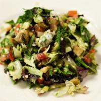 Dinner Chopped Salad · Lettuce, tomatoes, peppers, onions, olives, green beans, mushrooms, crumbled blue cheese, an...