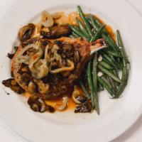 Dinner Pork Chop · 14 oz. frenched rib chop, broiled, haricot verts sauteed wild mushrooms or hot cherry peppers.