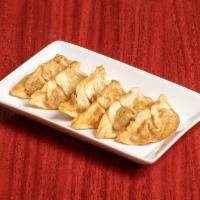 A1. Pan Fried Dumplings Chicken  · 6 pieces.