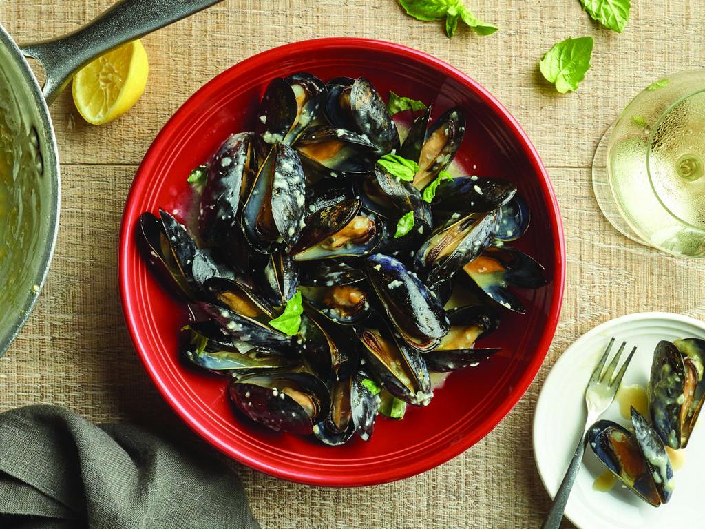 Cozze in Bianco · Mussels steamed in white wine, basil and our lemon butter sauce.