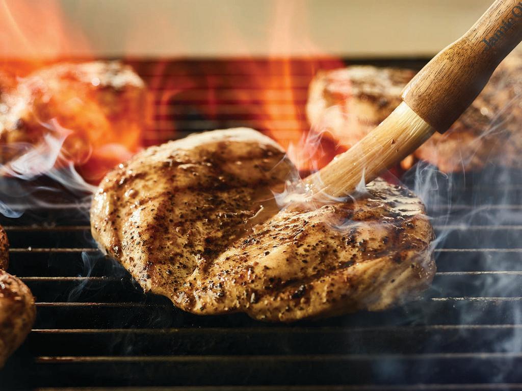 Tuscan-Grilled Chicken · Wood-grilled and seasoned with Mr. C's Grill Baste, olive oil and herbs.