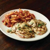 Pollo Rosa Maria · Wood-grilled chicken stuffed with fontina cheese and prosciutto, topped with mushrooms and o...