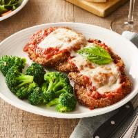 Eggplant Parmesan  · Layers of sliced eggplant coated with seasoned breadcrumbs  and topped with pomodoro  sauce,...