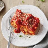 Lasagne · Pasta layered with our pomodoro sauce, meat sauce, ricotta, romano and mozzarella cheese.