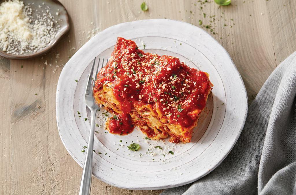 Lasagne · Pasta layered with our pomodoro sauce, meat sauce, ricotta, romano and mozzarella cheese.