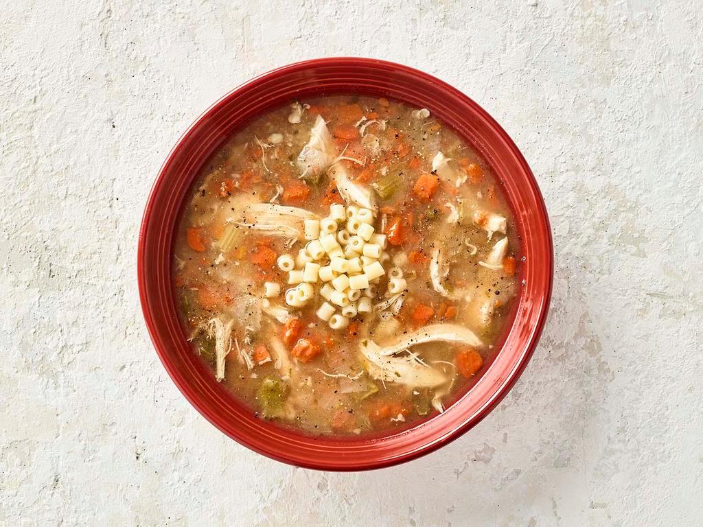 Mama Mandola's Chicken Soup - Bowl · Spicy chicken soup that has soothed the family for generations.