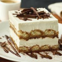 Tiramisu · Lady fingers dipped in liqueur laced espresso, layered with sweetened mascarpone, Myers's Ru...