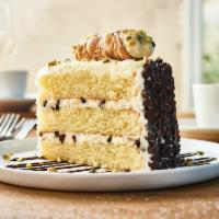 Cannoli Cake for Two** · Vanilla cake with layers of cannoli filling topped with pistachios and chocolate with a choc...