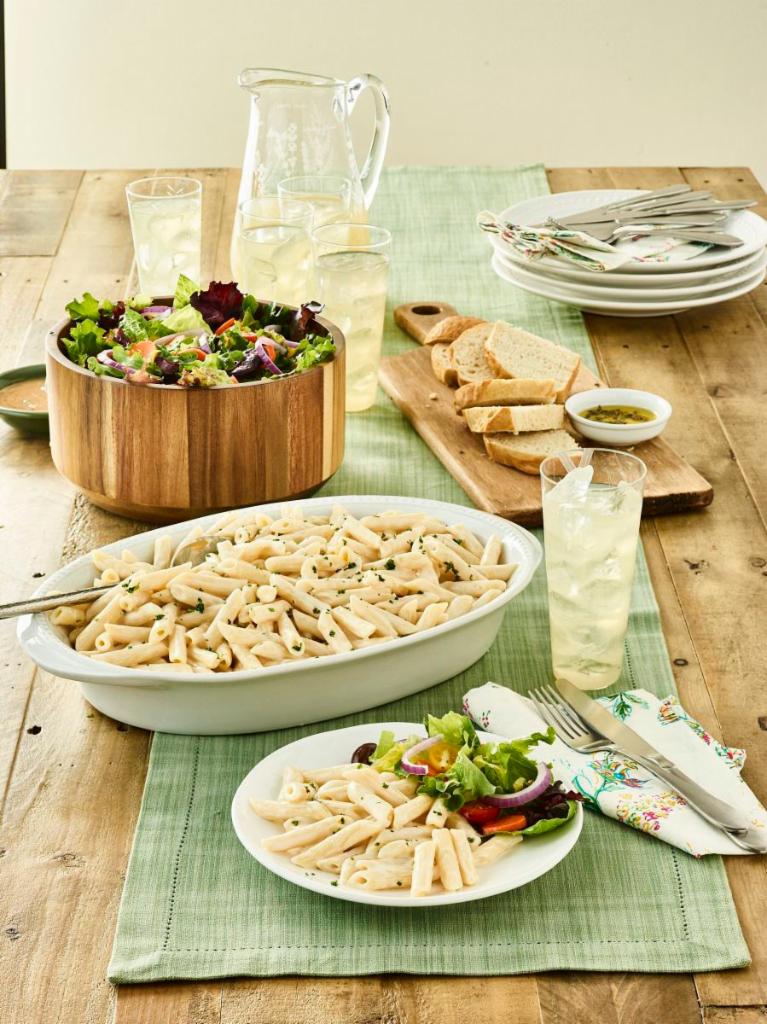 Family Bundle Penne Alfredo · Our made-from-scratch Alfredo tossed with Penne pasta. Includes your choice of side salad and bread. Feeds 4-5.