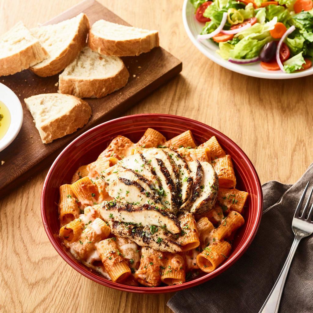 Family Bundle Rigatoni Al Forno · Large rigatoni tossed with our tomato cream sauce, topped with mozzarella cheese and baked. Includes your choice of soup or salad and bread. Feeds 4-5.