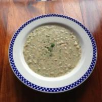Award Winning Clam Chowder · All natural, New England style with nitrate-free bacon, creamy and herby. Gluten free.