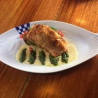Off the Hook Stuffed Salmon · Stuffed with Dungeness crab, wild Mexican Pacific prawns, havarti, Parmesan and Asiago chees...