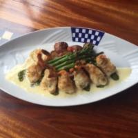 Stuffed and Puffed Prawns · Stuffed with Dungeness crab, wild Mexican Pacific prawns, havarti, Parmesan and Asiago chees...
