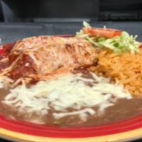 Enchiladas Combo Special · 2 Red Enchiladas filled with cheese topped with cheese served with a side of Rice and Beans.