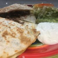 Quesadilla Supreme · Melted cheese and Choice of Meat. Asada carnitas or Chile verde. 