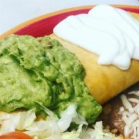 Chimichanga A La Carta · Choice of Meat, Filled with Cheese, Sour Cream and Homemade Guacamole. Asada, carnitas or Ch...