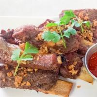 Garlic Spare Ribs Plate · House-marinated pork spare ribs with side of tangy sweet chili sauce