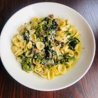 Orecchiette con Salsiccia · Broccoli rabe, fennel sausage, garlic, chili flakes, pecorino