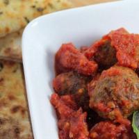 Piola’s Meatballs · Homemade beef and pork meatballs slow cooked in San Marzano tomato sauce, served with focacc...