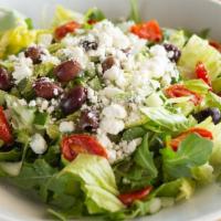Aristotele Salad · Arugula, goat cheese, roasted cherry tomatoes, Kalamata pitted olives, cucumbers, and olive ...