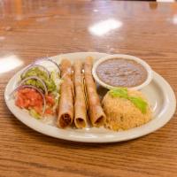 #6. Las Originales Flautas · 3 chicken or beef flautas served with rice, refried beans, salad, guacamole and sour cream.