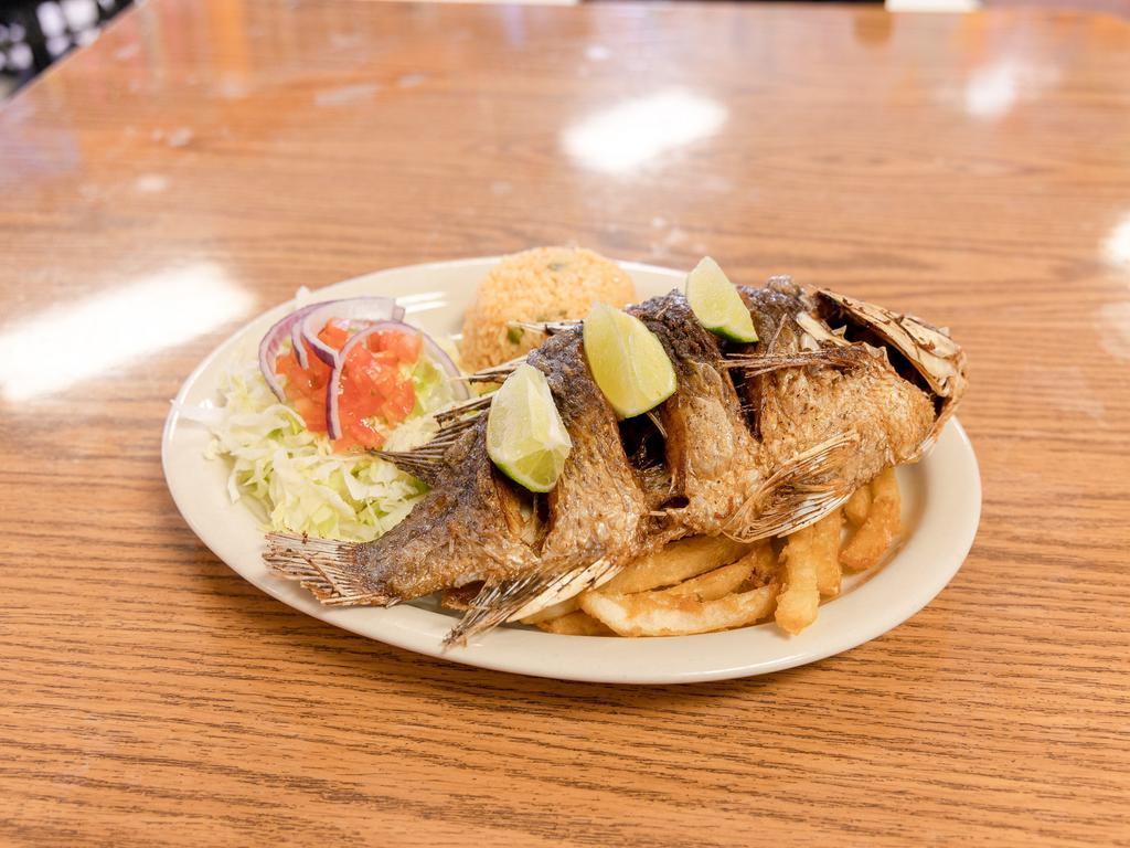 Mojarra Frita · Whole fried tilapia, served with salad, rice and french fries.