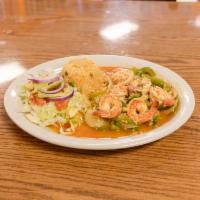Camarones al Mojo de Ajo · Delicious garlic style shrimp, served with rice salad and avocado.