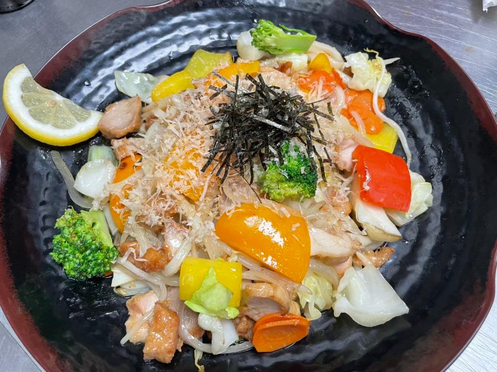 Yaki Udon · Udon noodle, sea salt based sauce, lemon, cabbage, bean sprout, onion, bonito, red ginger, paprika, mayo, broccoli, carrot, nori, and choose 1 protein from fried tofu, chicken, chashu or shrimp