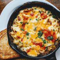 Veggie  · Hash browns, Cheddar, jack cheese, two eggs, mushrooms, bell peppers, spinach, onions, tomat...