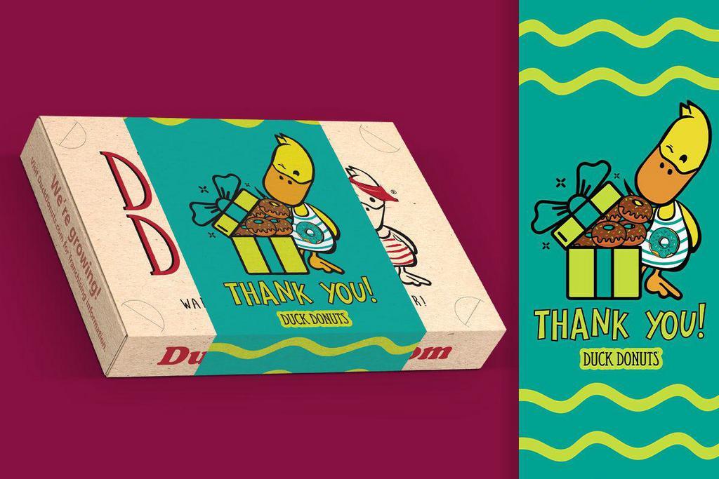 Thank You Gift Wrap · Wrap our dozen box of donuts with our new Duck Donuts Thank You-themed wrap. 

Please note: If ordering more than one dozen in your order, please note which dozen we should apply your wrap to in the Special Instructions box below.