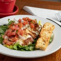 Warm Goat Cheese Medallions · 2 crusted medallions of goat cheese topped with fresh pico de gallo served with toast points...