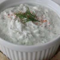 Tzatziki Dip · Homemade creamy Greek yogurt sauce with cucumbers and fresh garlic,mint topped with olive oi...