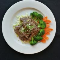 S4. Garlic Sauce · Garlic, ground pepper, broccoli, carrot and lettuce. Served with Jasmine rice.