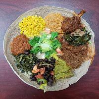Meat and Veggie Combo No. 2 · Mild and spicy. Spicy lentils, yellow peas, collard greens, house salad, key wot, alicha, go...