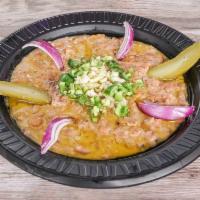 Foul Medames · Seasoned fava beans cooked with lemon juice, serrano peppers, garlic, seasoning and topped w...